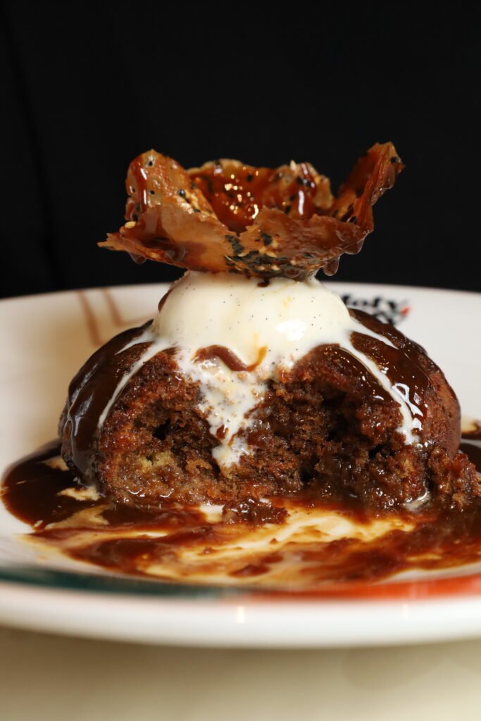 Molten chocolate lava cake with vanilla ice cream at Holy Belly Bangkok